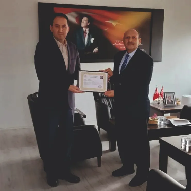 ÖZÇAL’a Başarı Belgesi Takdim Edildi